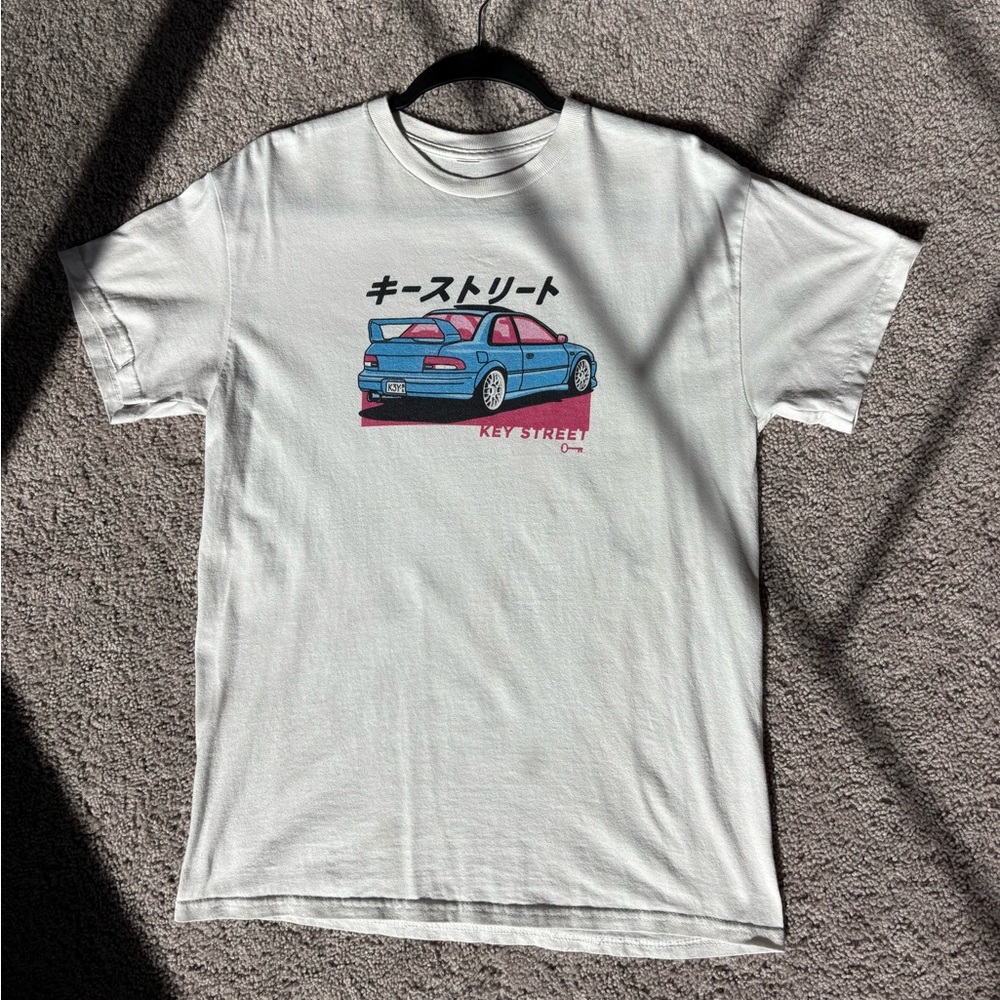 White Graphic Tee with Car Design